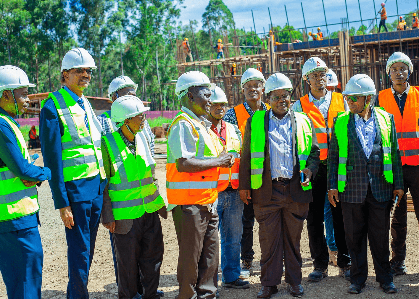 The Industrial Advisory Committee members receiving information from Eng. Mkisi, a representative of the consultant of the construction project at MUST Main Campus